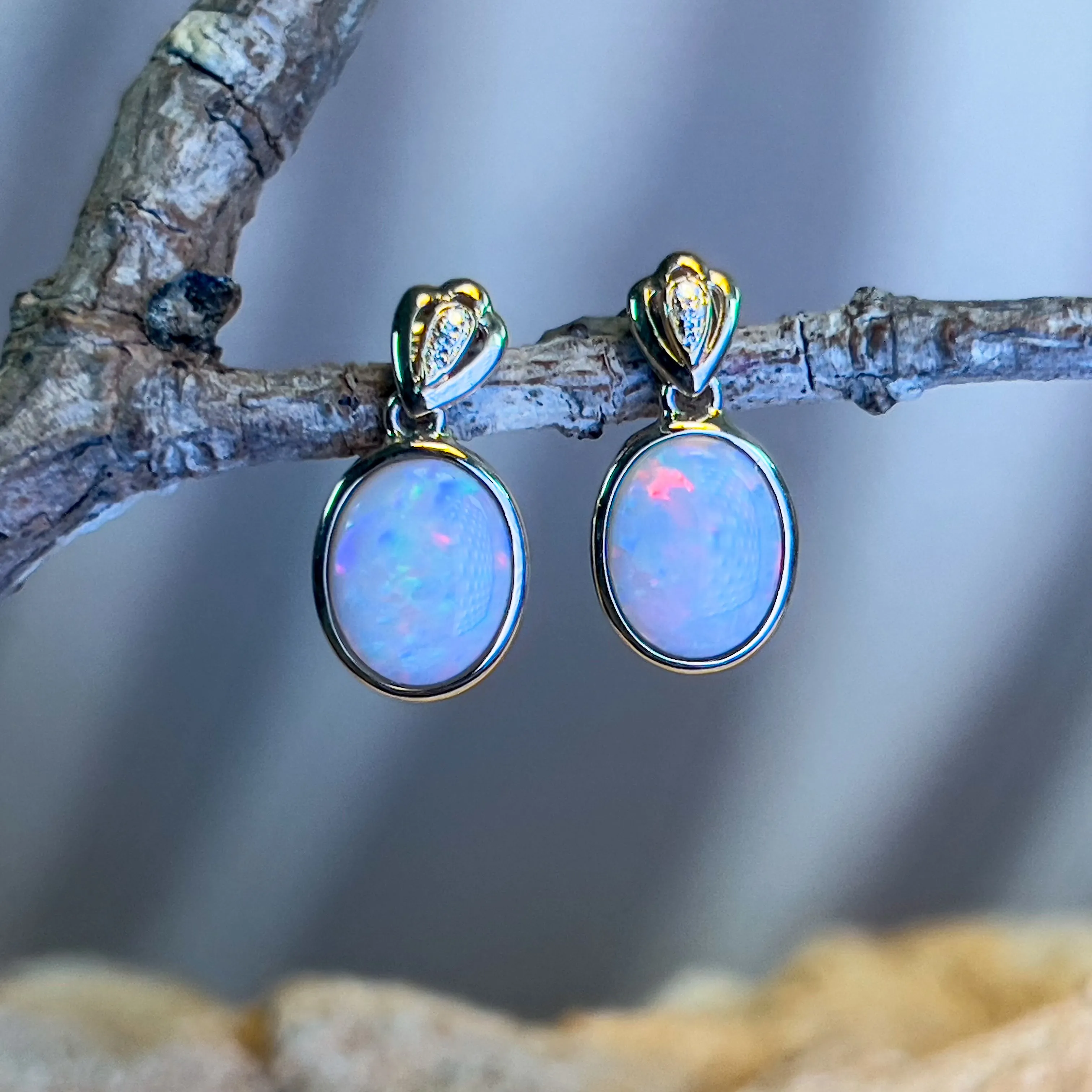 14kt Yellow Gold Oval Dark Opal 2.08ct bezel set earring drops