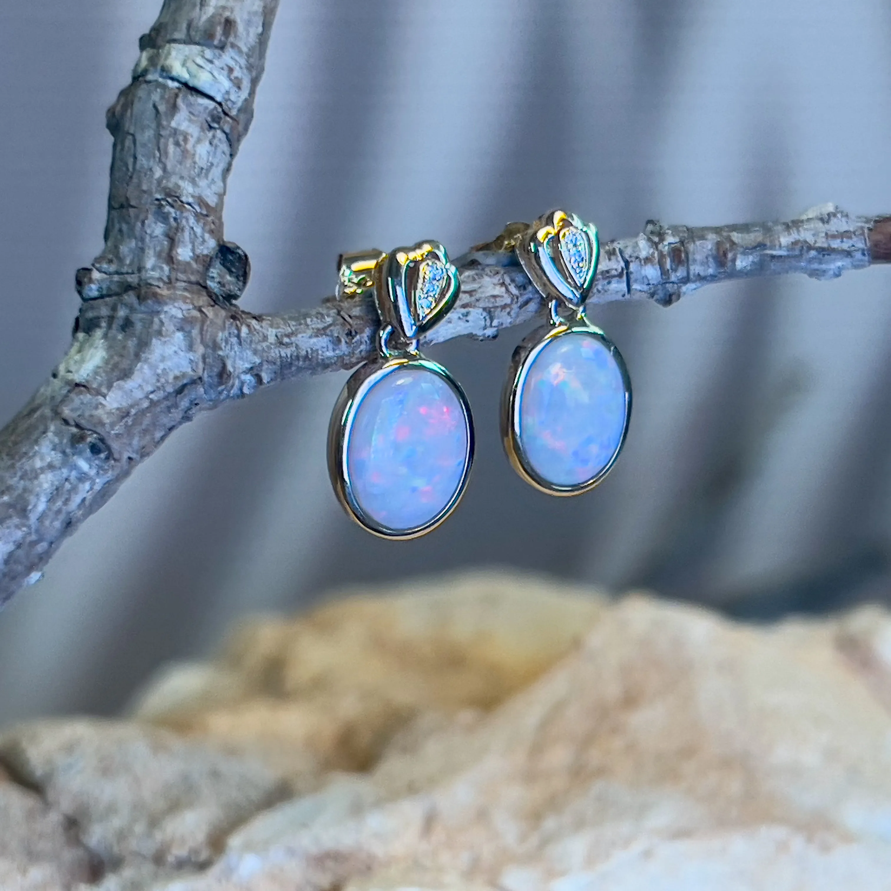 14kt Yellow Gold Oval Dark Opal 2.08ct bezel set earring drops