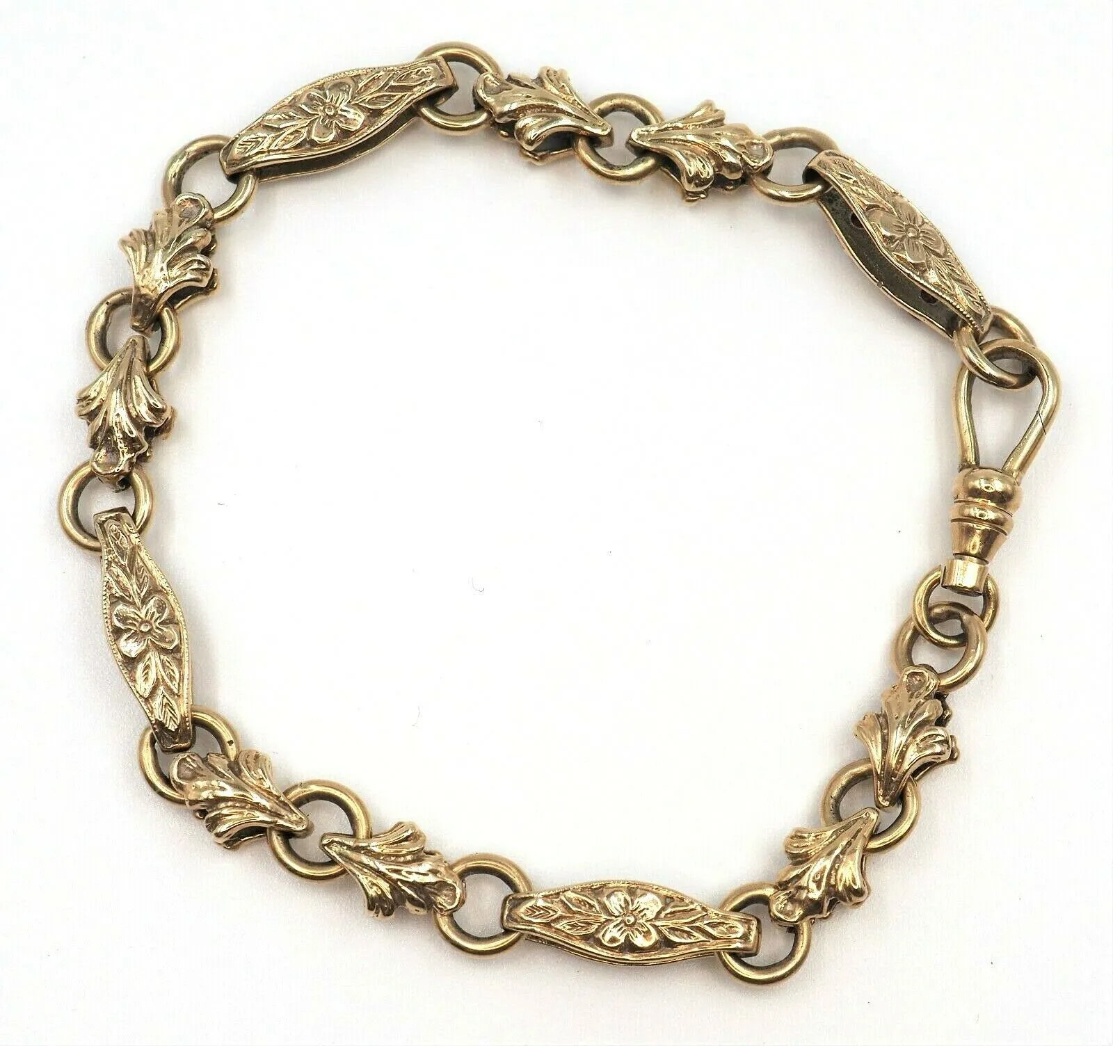 Ruby 9ct Yellow Gold Bracelet with Fleur de lis & Flower Patterned Links