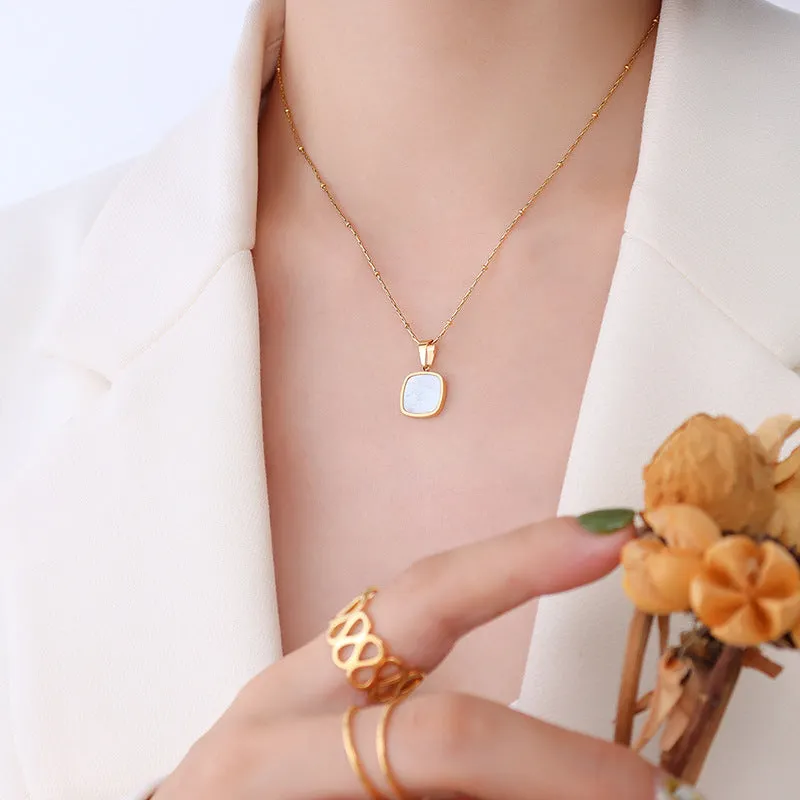 Seashell White Acrylic Necklace with Geometric Design