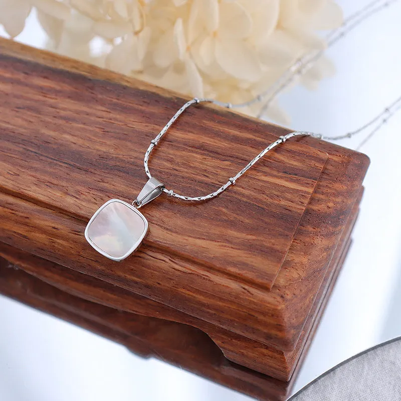 Seashell White Acrylic Necklace with Geometric Design